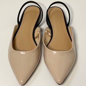 Express nude and black flats